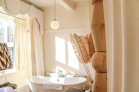 Deluxe Double Room | Bathroom | Separate tub and shower, deep soaking tub, rainfall showerhead