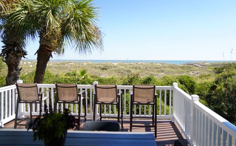 Private mid-level deck off the main living area with outdoor dining and lounging. Sip and chat while staring into the beautiful coastline.