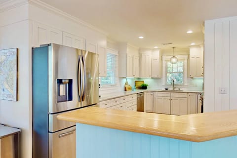 Cooking and clean up is a breeze in this bright and modern kitchen