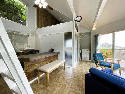 Basic Villa | Living area | Flat-screen TV