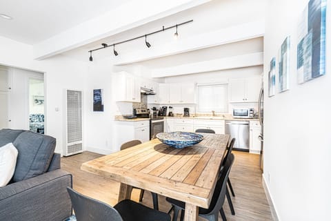 The dining area includes seating for 6 and opens out to the kitchen, making meal prep a social affair!
                