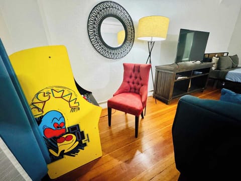 A nostalgic getaway to San Diego! Relive your arcade glory days with Pac-Man fun in our loft suite!