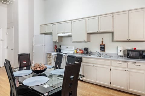 Full Kitchen includes all pots, pans, silverware, coffee maker, coffee, sugar, creamer, tea, blender, toaster, refrigerator, microwave, glasses, wine glasses and cooking/eating utensils