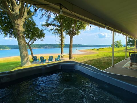 Soak away your cares while enjoying the lake view!