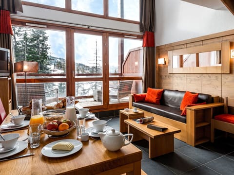 Table, Furniture, Property, Couch, Wood, Tableware, Orange, Interior Design, Window, Lighting