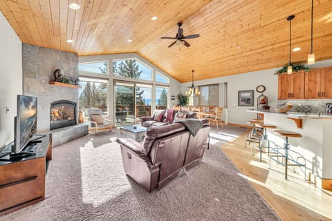 Living room: Gas fireplace, TV with cable, central heat, no A/C