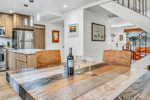 Dining area sits right off the kitchen, making it easy to serve meals and stay connected with the group.
