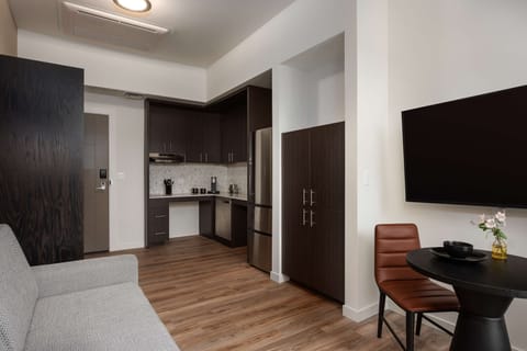 Room, 1 King Bed, Kitchenette (Mobility, Roll-In Shower) | Private kitchen | Mini-fridge, coffee/tea maker, highchair