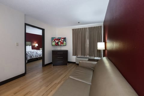 Suite, 1 King Bed, Accessible (Smoke Free) | Desk, iron/ironing board, free cribs/infant beds, free WiFi