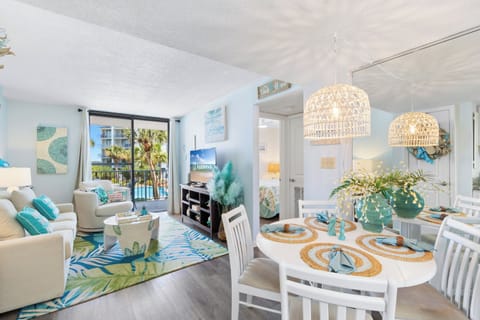 Signature Condo, 2 Bedrooms, Balcony, Pool View | Living room | 55-inch Smart TV with cable channels, TV