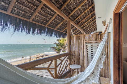 Sea Front Superior Suite | Minibar, in-room safe, iron/ironing board, free cribs/infant beds