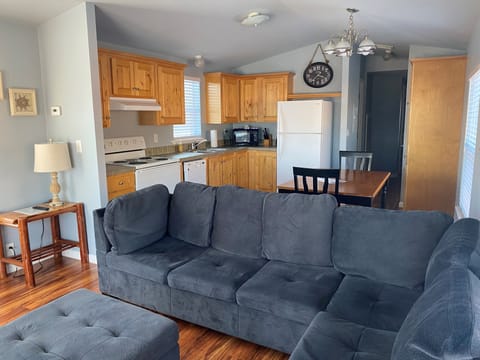 Comfort Cabin, 2 Bedrooms, Kitchen, Canal View | Living area | 50-inch LED TV with digital channels, TV