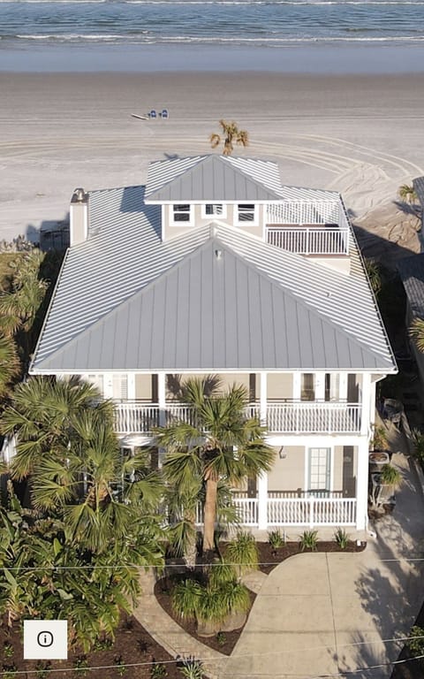 House is directly on the beach with private walkway. 