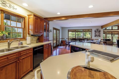 Cook up a great meal in the kitchen on the main level facing toward the lake.  Enjoy snacks and conversation around the awesome kitchen island.