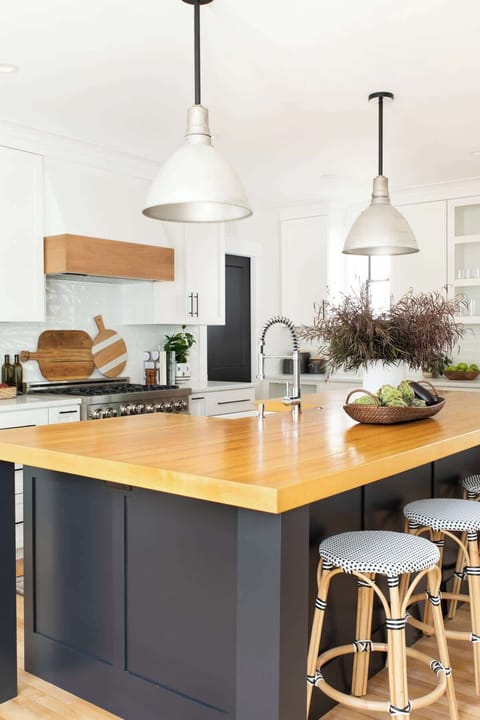 Get ready to strike up some major style points with this reclaimed bowling alley island countertop - it'll be a perfect strike every time! #HomeStyleGoals