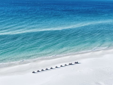 Immerse yourself in the balcony views from Sunset Cove at The Pearl of Navarre. 