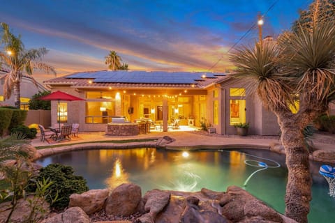Backyard with heated pool and great for entertaining