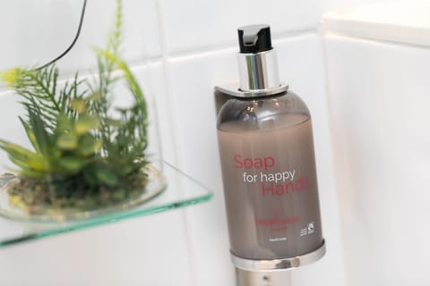 Shower, eco-friendly toiletries, hair dryer, towels