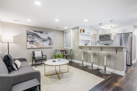 My cozy living room has an open sightline to the kitchen