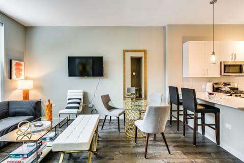 The dining table easily seats 4 - the other chair is in a bedroom