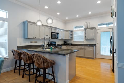 Fully Stocked Kitchen is equipped with pots, pans, glassware, and utensils to prepare your home cooked meals!