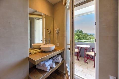 Quadruple Room, Balcony | Bathroom | Combined shower/tub, hair dryer, bidet, towels