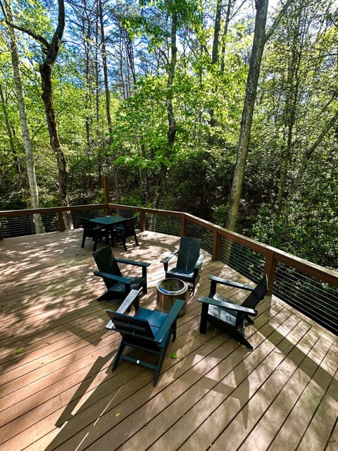 Large deck overlooking creek
 - Solo Stove & firewood provided