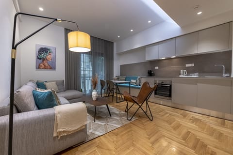 Luxury Apartment | Living area | 42-inch Smart TV with digital channels, TV