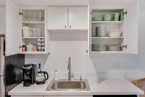 Fully stocked kitchen with everything you need to cook as well as complimentary coffee and tea.