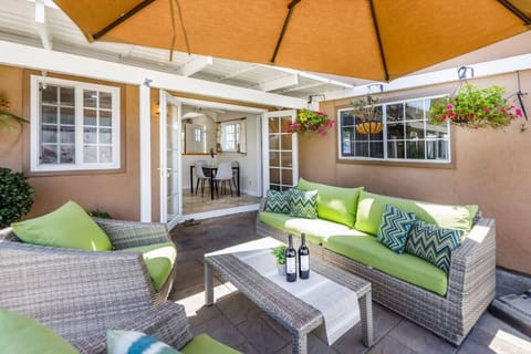 Sitting area with large umbrella covering