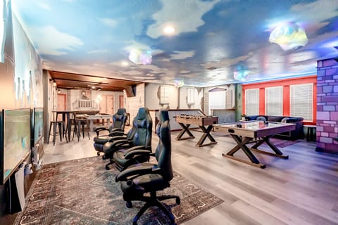 Welcome To A Wand And A Wish! Step inside your beautiful escape that includes this Harry Potter-themed game room with air hockey, foosball, an infinity game table, Xbox, PlayStation, and more.
