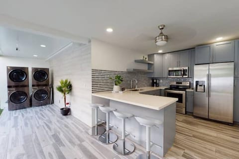 OUTDOOR KITCHEN AND LAUNDRY ROOM VIEW