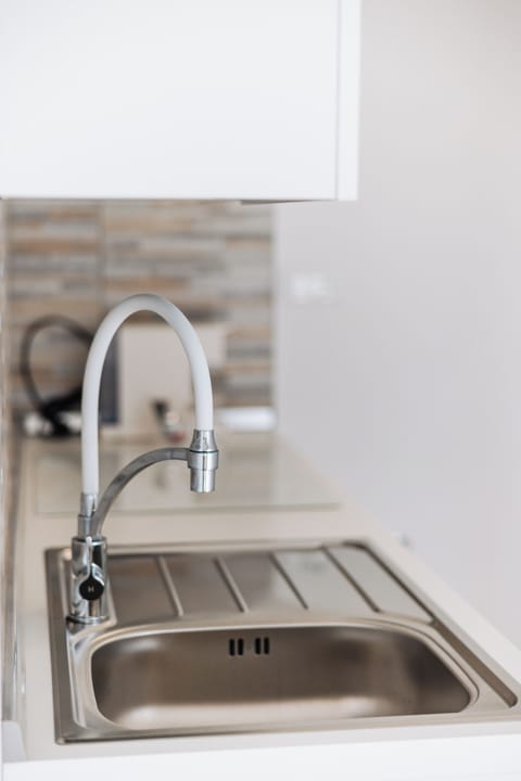 Junior Suite con terrazza | Private kitchen | Espresso maker, coffee/tea maker