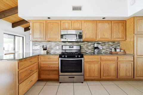 Drip coffee maker plus a starter supply of organic medium roast coffee.