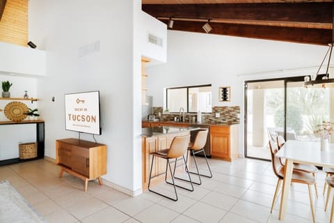 Plenty of natural light in the living, dining, and kitchen.