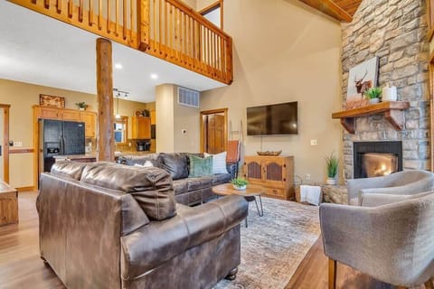 Cozy up in front of the gas, floor to ceiling stone fireplace!