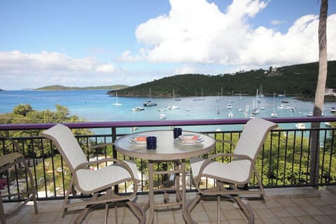 Your view from Windcatcher includes Cruz Bay, fiery sunsets, and St Thomas