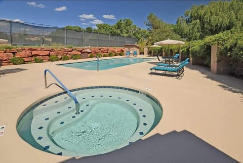 Canyon Mesa has a community, saltwater pool (seasonal from 4/15 - 11/15, weather permitting) and a year round hot tub.