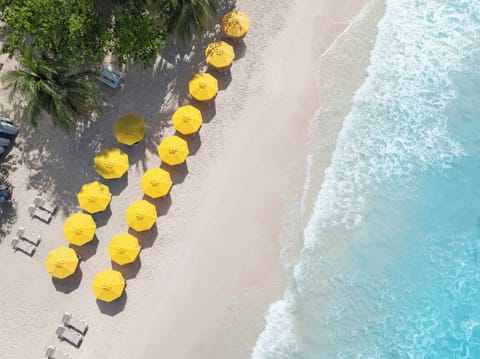 Beach nearby, white sand, sun loungers, beach towels
