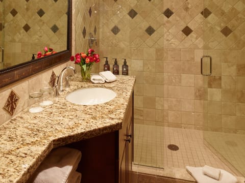 Designer toiletries, hair dryer, bathrobes, towels