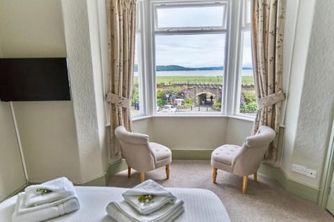 Luxury Double Room, Sea View | Iron/ironing board, free WiFi, bed sheets