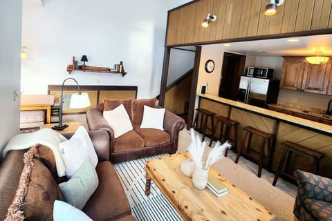 Inviting living room with a convenient food bar