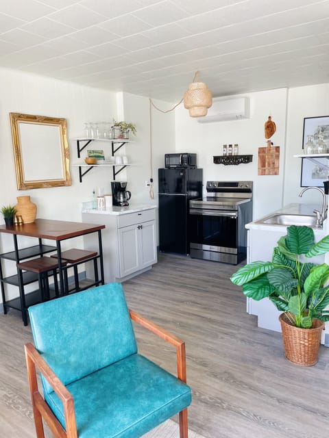 Looking into the kitchen area from living room area.