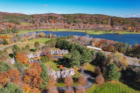 Aerial view of Lakeland Village alongside the Highland Golf Course and Lake Pinneo