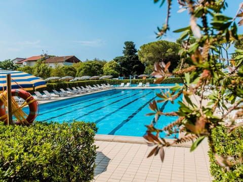 Water, Plant, Sky, Swimming Pool, Azure, Tree, Outdoor Furniture, Leisure, Shade, Building