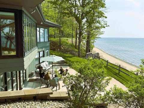 Escape to the Florence Ely Hunn House - A Modern Architectural Gem with Panoramic Lake Michigan Views