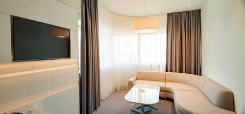 Suite, 1 King Bed (Additional Living Area) | Premium bedding, minibar, desk, soundproofing