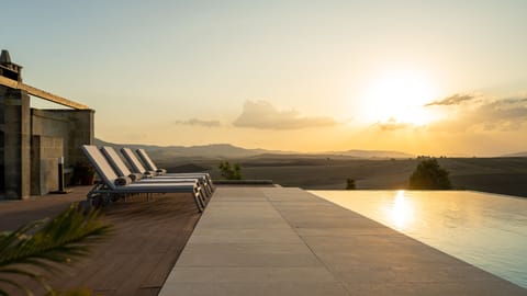 Large heated, salt water, infinity pool with spectacular views and sunsets