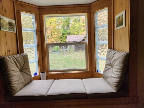 Nothing beats reading in a window seat while someone else cooks your meal :)