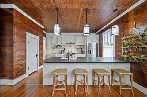Fully equipped chef’s kitchen with stainless appliances and coffee bar